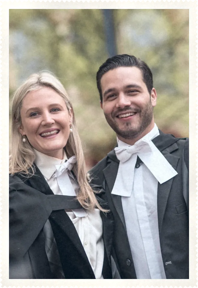 Katie and Carlos graduating in Cambridge